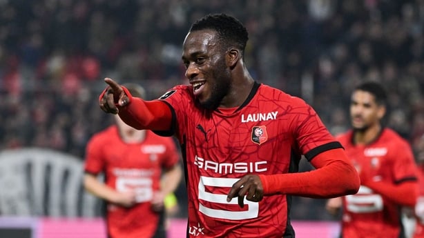 Rennes' French forward #09 Arnaud Kalimuendo celebrates scoring his team's fifth goal during the French L1 football match between Stade Rennais FC and Saint-Etienne (ASSE) at the Roazhon Park Stadium in Rennes, western France on November 30, 2024. (Photo by Damien Meyer / AFP)