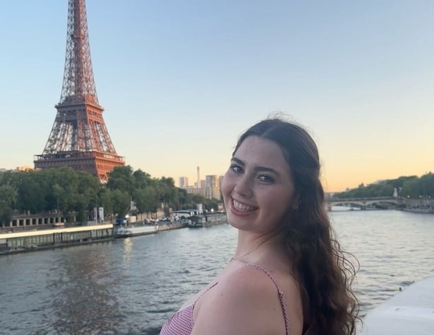 Caoimhe Graham in front of the Eiffel Tower in Paris, France