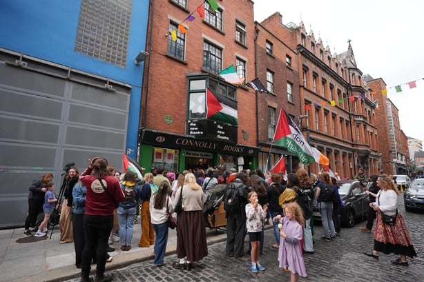 People attend a music session staged in Connolly Books in Dublin's Temple Bar area to show solidarity for Kneecap's Liam Og O hAnnaidh after he appeared at Westminster Magistrates' Court, in London, charged with a terrorism offence. The 27-year-old, of Belfast, who performs under the stage name Mo C