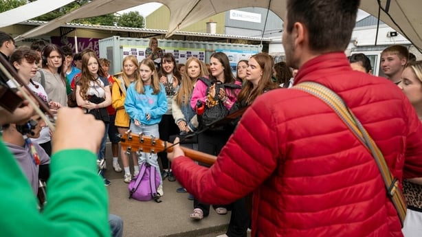 Students pictured in a large group practicing for a gala concert in Lurgan