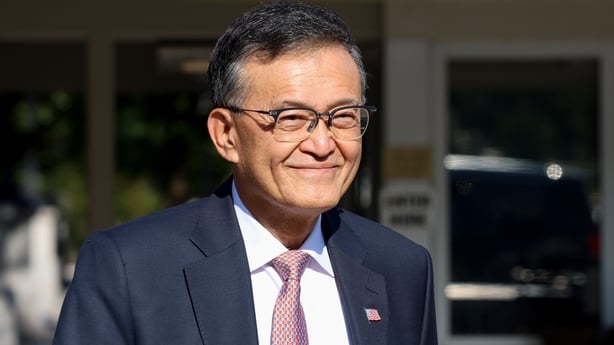 A man walks out of a building