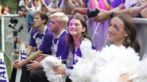 Fans and cheerleaders rally together at Merrion Square Park in Dublin as Kansas State University kicks off festivities for the Aer Lingus College Football Classic