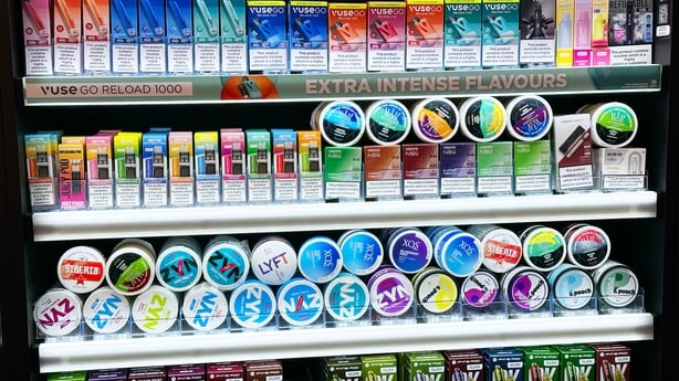 Nicotine pouches and vapes in a shop display