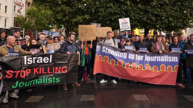 A vigil is held on O'Connell Street in Dublin for journalists killed in Gaza