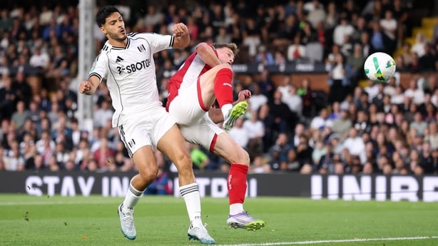 LONDON, ENGLAND - AUGUST 27: George Tanner of Bristol City scores an own goal whilst under pressure from Raul Jimenez of Fulham to make it the first goal for Fulham during the Carabao Cup Second Round match between Fulham and Bristol City at Craven Cottage on August 27, 2025 in London, England. (Pho