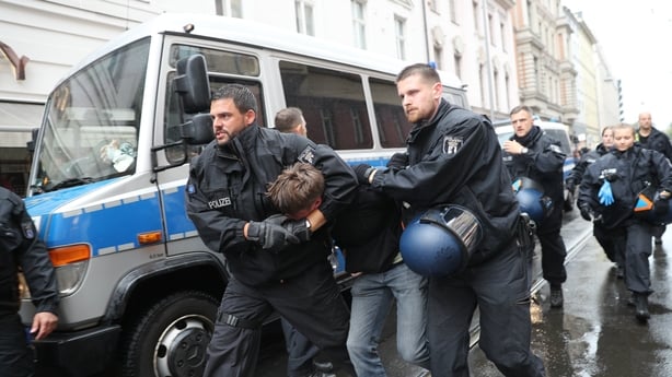 Clashes broke out during a pro-Palestinian demonstration at Hackescher Markt in Berlin, Germany on August 28, 2028. Protesters gathered to denounce the killing of journalists and Israeli attacks in Gaza. Police officers used a force against a female protester and detained 8 protester during the demo