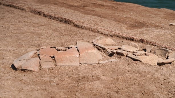 This picture shows ancient graves unearthed by members of the Dohuk Antiquities Department on the banks of Mosul Dam in Iraq