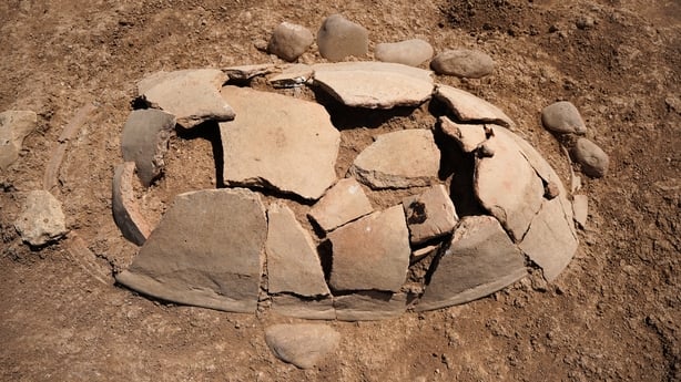 This picture shows ancient graves unearthed by members of the Dohuk Antiquities Department on the banks of Mosul Dam in Iraq