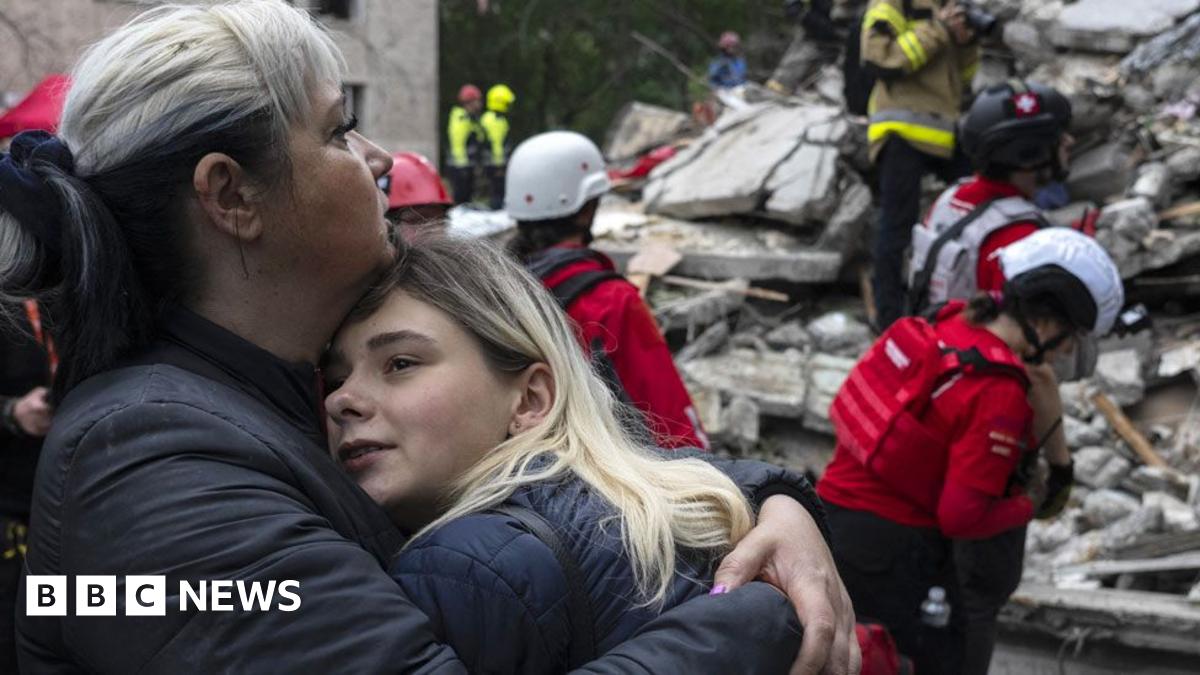 Dust rises as a Ukrainian soldier drives a tank down a dirt road in Kherson, Ukraine on 8 August.