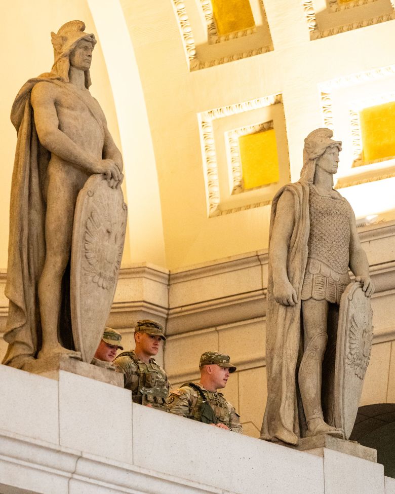 Members of the National Guard stand watch as Vice President JD Vance, not pictured, arrives to greet other members of the National Guard at Union Station in Washington, DC, on Wednesday.