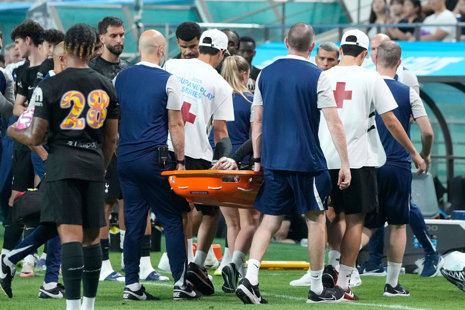 James Maddison left the pitch on a stretcher during Tottenham’s 1-1 draw with Newcastle in Seoul (AP Photo/Ahn Young-joon/PA)