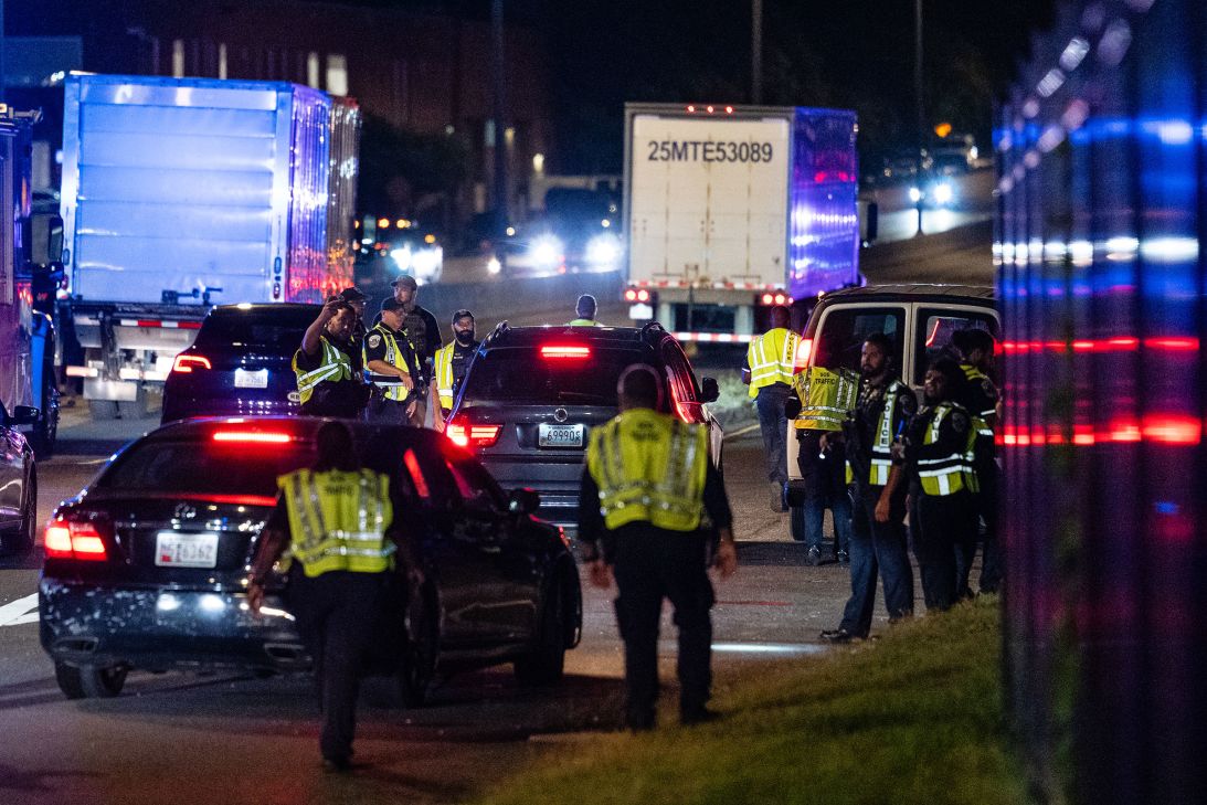 Metropolitan Police Department officers and federal agents operate a vehicle checkpoint on New York Avenue NE in Washington, DC, on Wednesday.