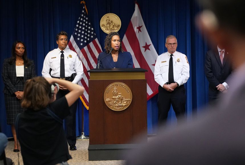 Washington, DC Mayor Muriel Bowser, center, is joined by Chief of Police at the Metropolitan Police Department Pamela Smith, left, Fire and Emergency Medical Services Chief Chief John Donnelly and other members of her administration, at a press conference on Monday.