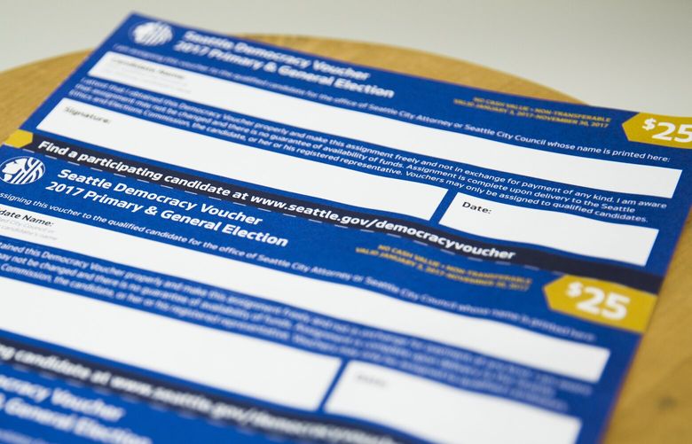 Democracy vouchers on Friday, July 28, 2017 in Seattle Times studio. 202958