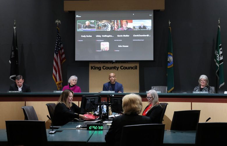 Left to right are  King County Councilmembers Rod Dembowski, Sarah Perry, Girmay Zahilay, and Claudia Balducci during a King County Council meeting in council chambers Tuesday, January 28, 2025.