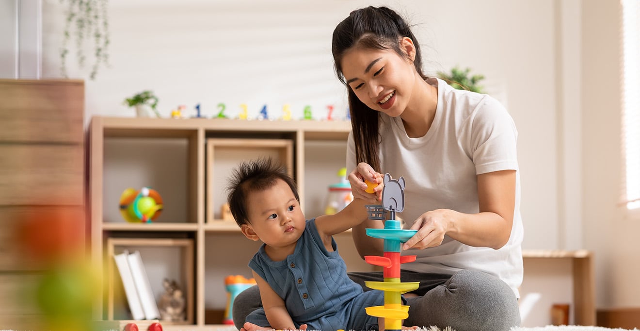Mother and baby playing