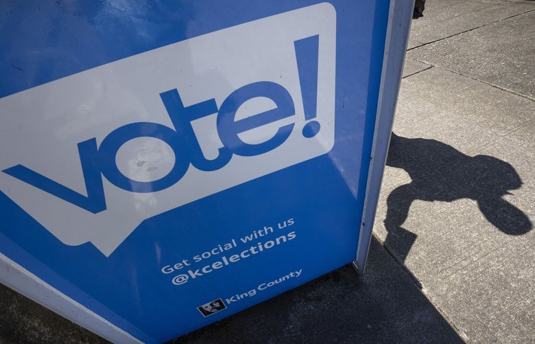 A voter drops off  a ballot drop-off box at the Rainier Community Center in Seattle Tuesday, August 5, 2025.  Today is primary election day. 230869