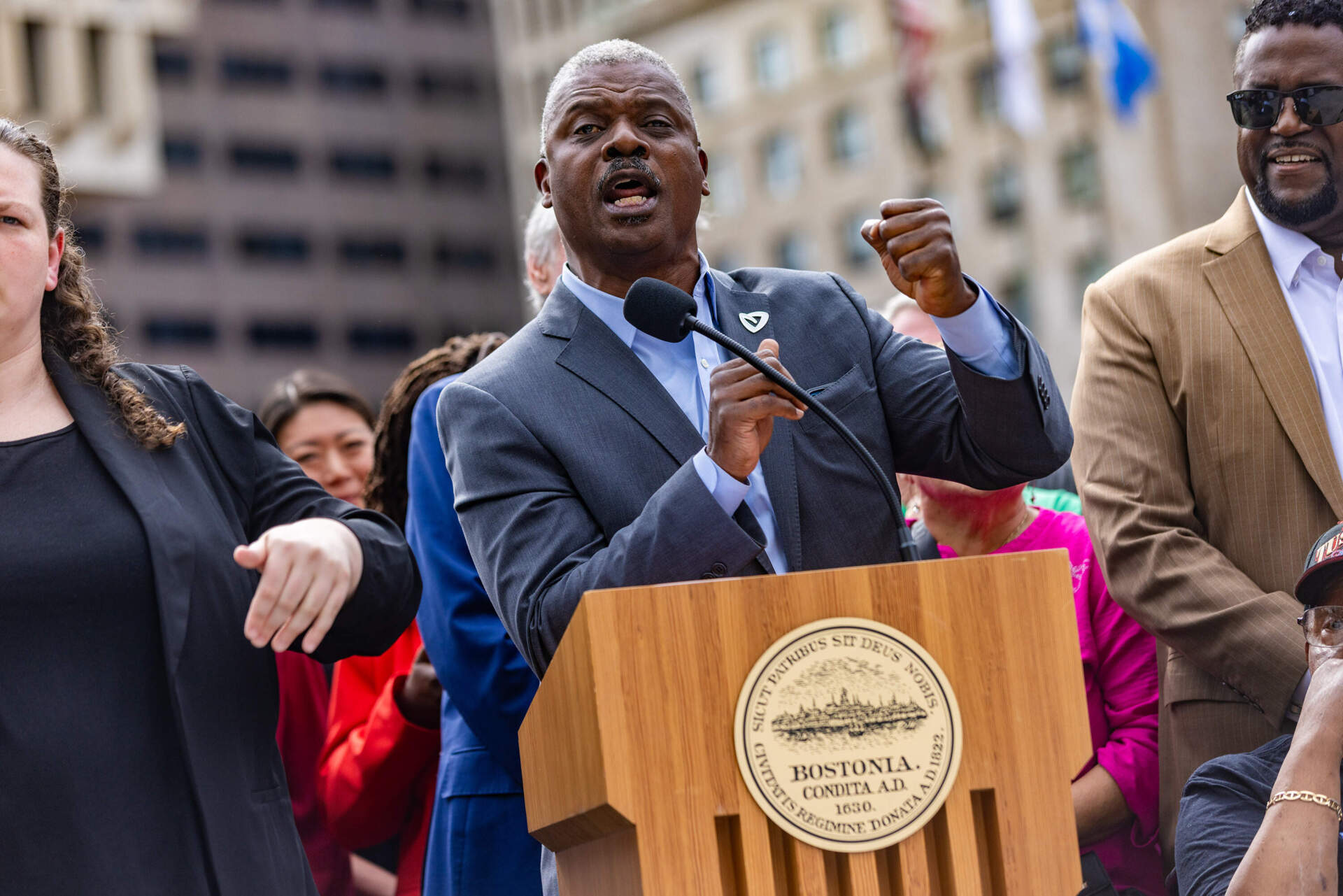Rev. Jeffery Brown speaks to the crowd gathered on Boston's City Hall Plaza Monday. (Jesse Costa/WBUR)