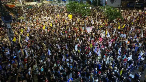 Getty Images Aerial shot shows hundreds of people at a demonstration in Tel Aviv