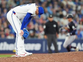Toronto Blue Jays pitcher Jeff Hoffman reacts