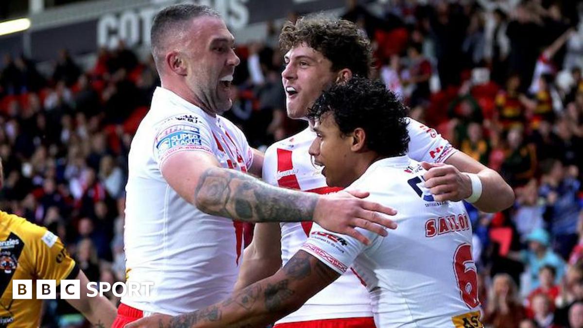 St Helens player Owen Dagnall is congratulated by teammates after scoring a try against Castleford Tigers.