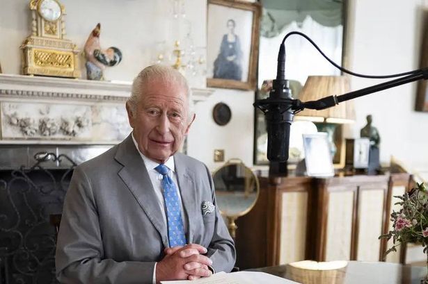 The King at his desk in the Morning Room at Clarence House recording his message to mark the 80th anniversary of VJ Day