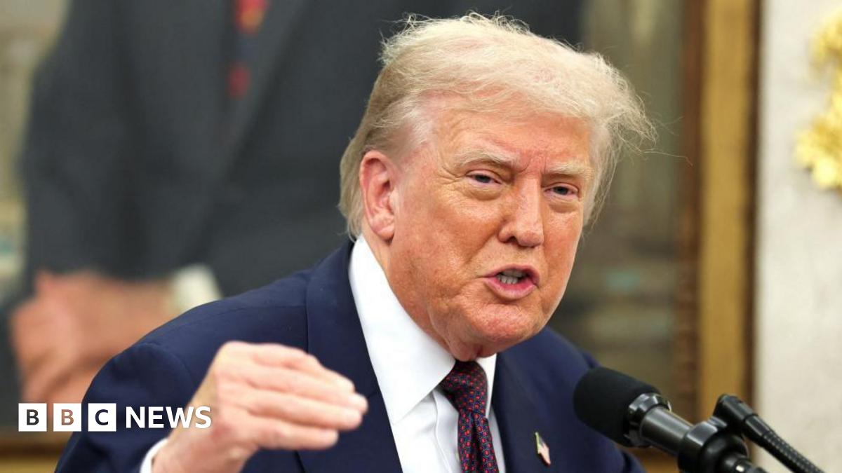 David Lochridge in a submersible looking out at an underwater reef