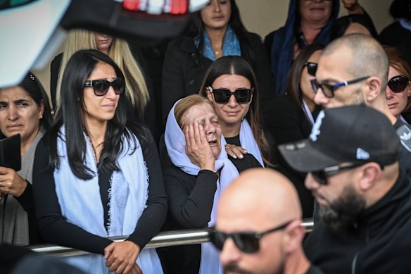 Emotional scenes at the funeral. 