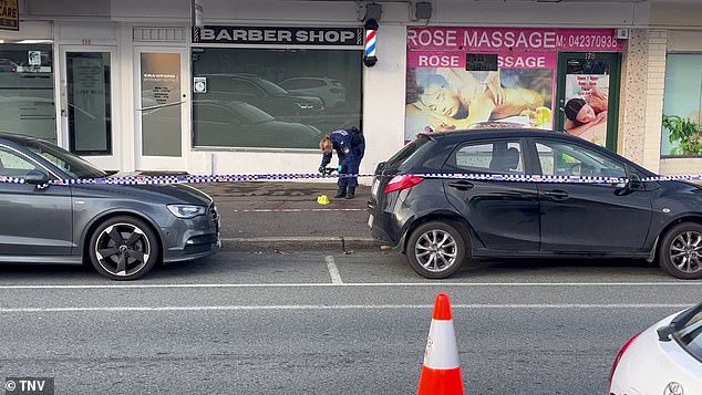 Police have established a crime scene outside a barber shop where two men were stabbed in Queanbeyan