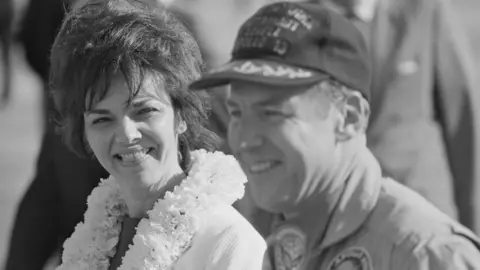 Getty Images A black and white photo of Jim and Marilyn Lovell