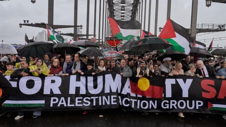 Protesters chant in support of Palestine during march across Sydney Harbour Bridge – video