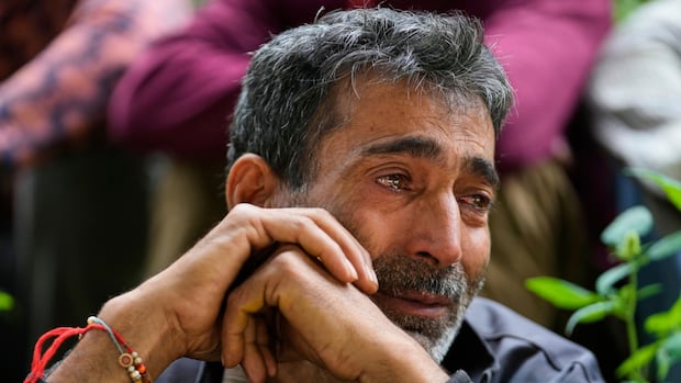 At least 280 people killed by flash floods in India and Pakistan, with scores still missing