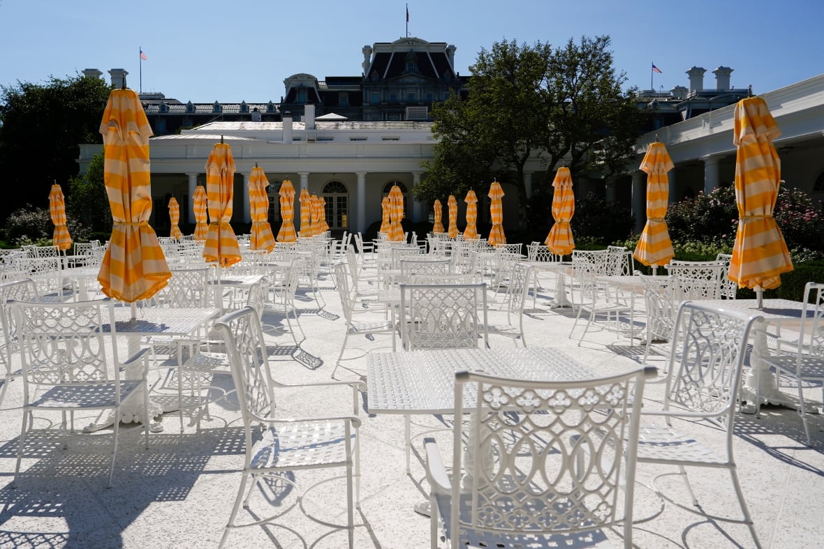 Tables and chairs stand in the newly renovated Rose Garden of the White House, Saturday, Aug. 9, 2025, in Washington.