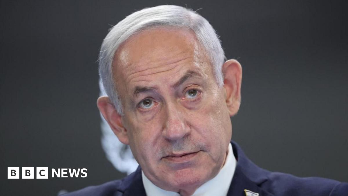 A file photo of Netanyahu - he is wearing a suit and looking up