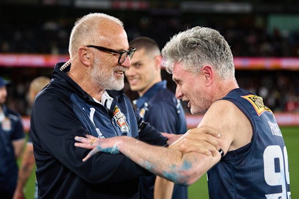 In pain: Victoria coach Tim Watson and Dave Hughes.