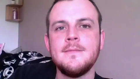 Marcus Johnson sitting at home