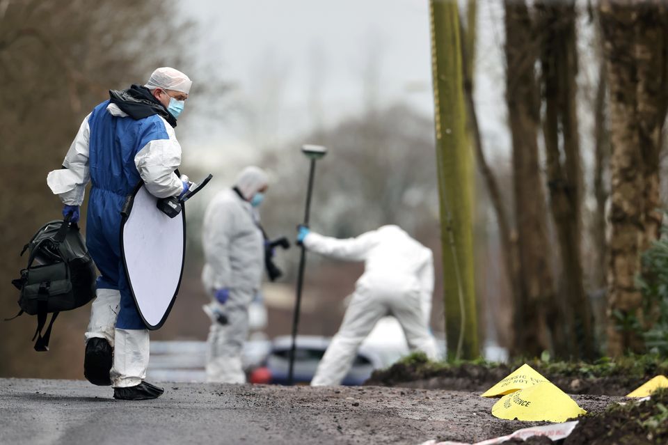 Forensic officers at the scene of the shooting in 2023 (Liam McBurney/PA)