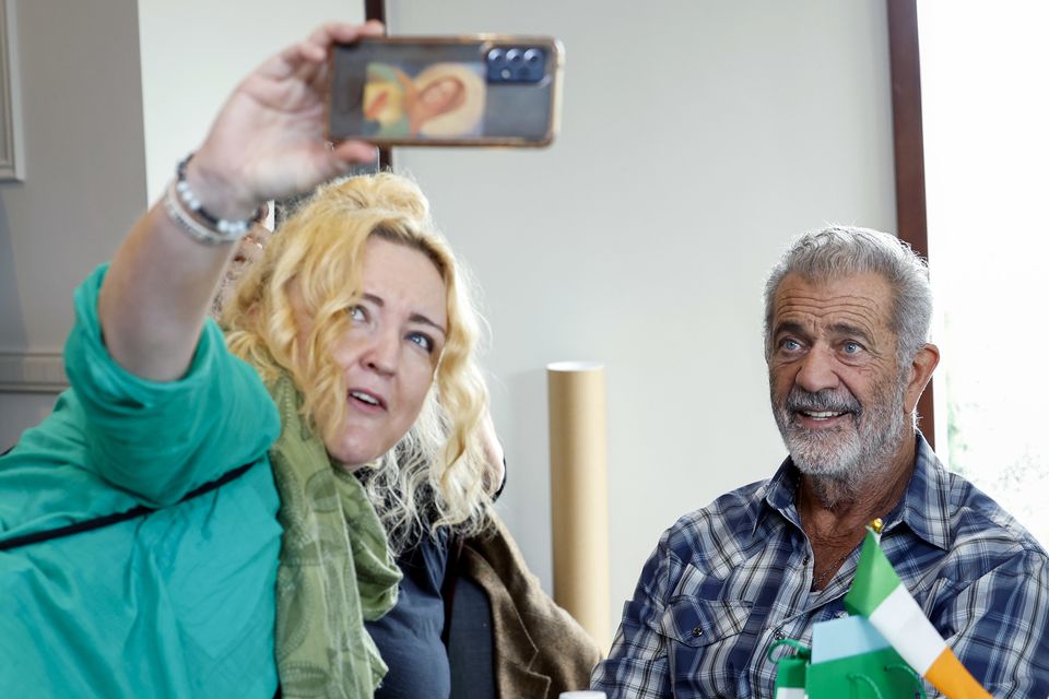 Mel Gibson poses for a selfie with Antoinette Dillon, from Finglas, Dublin (Conor O Mearain/PA)