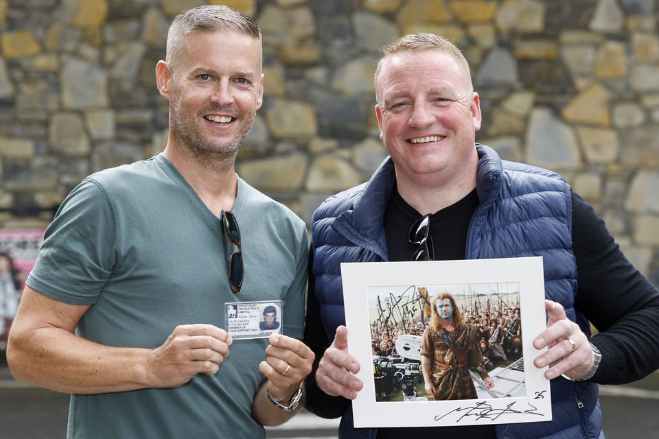 Gary Downes (left) and Vinny McConnell, who worked as extras on the film Braveheart, pose with memorabilia from the production (Conor O Mearain/PA)