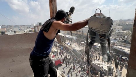 Journalists among 20 Palestinians killed in Israeli strike on Gaza hospital – video