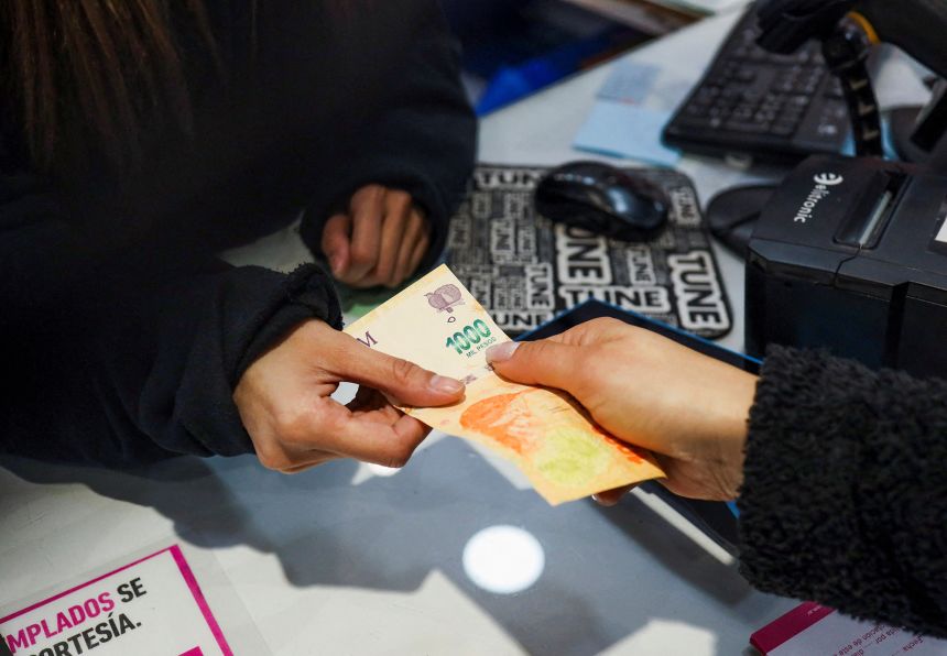 A one thousand Argentine peso bill is shown inside a store, in Buenos Aires, Argentina, in July 2022.