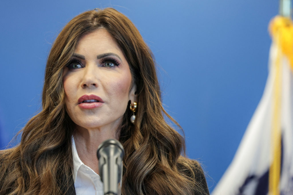 Homeland Security Secretary Kristi Noem speaks during a press conference after a CBP officer was shot by a criminal illega...