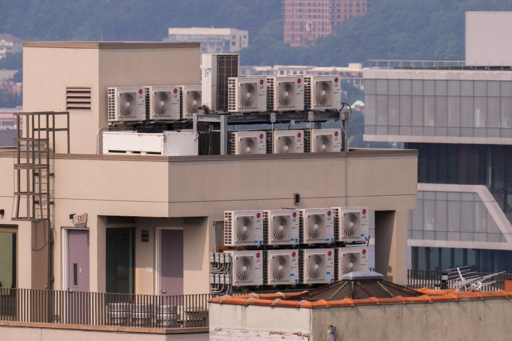Air conditioning units are seen in the Harlem neighborhood amid a Legionnaires' disease outbreak in New York City