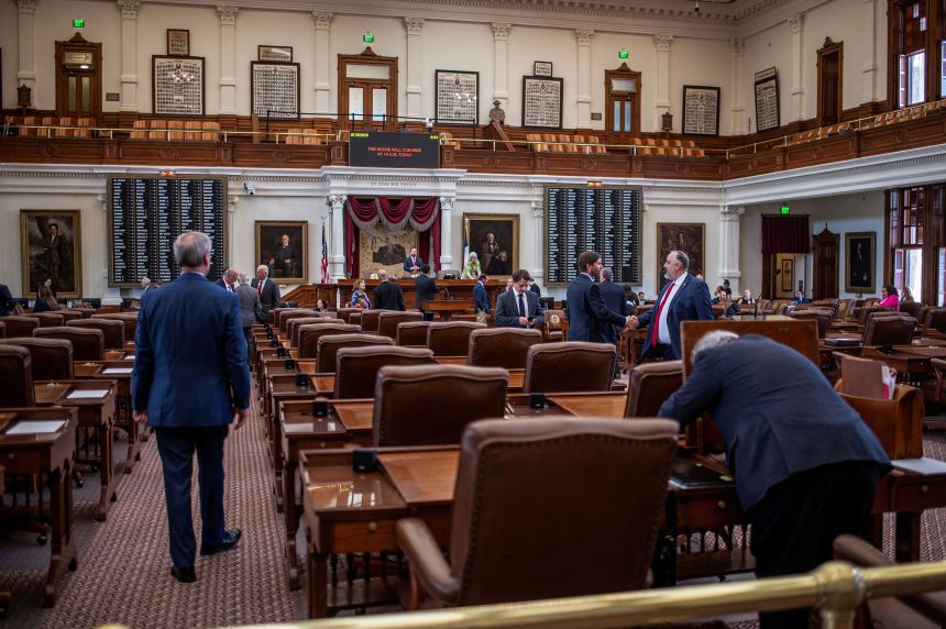 Lawmakers gather on the House floor on the day of a special session of the Texas House after Democratic lawmakers left the state to deny Republicans the opportunity to redraw the state's 38 congressional districts, in Austin, Texas, August 15, 2025.