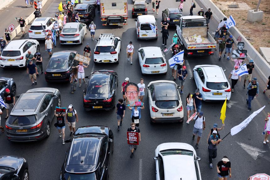 Protesters block the Ayalon access road to Tel Aviv in Israel on Sunday.