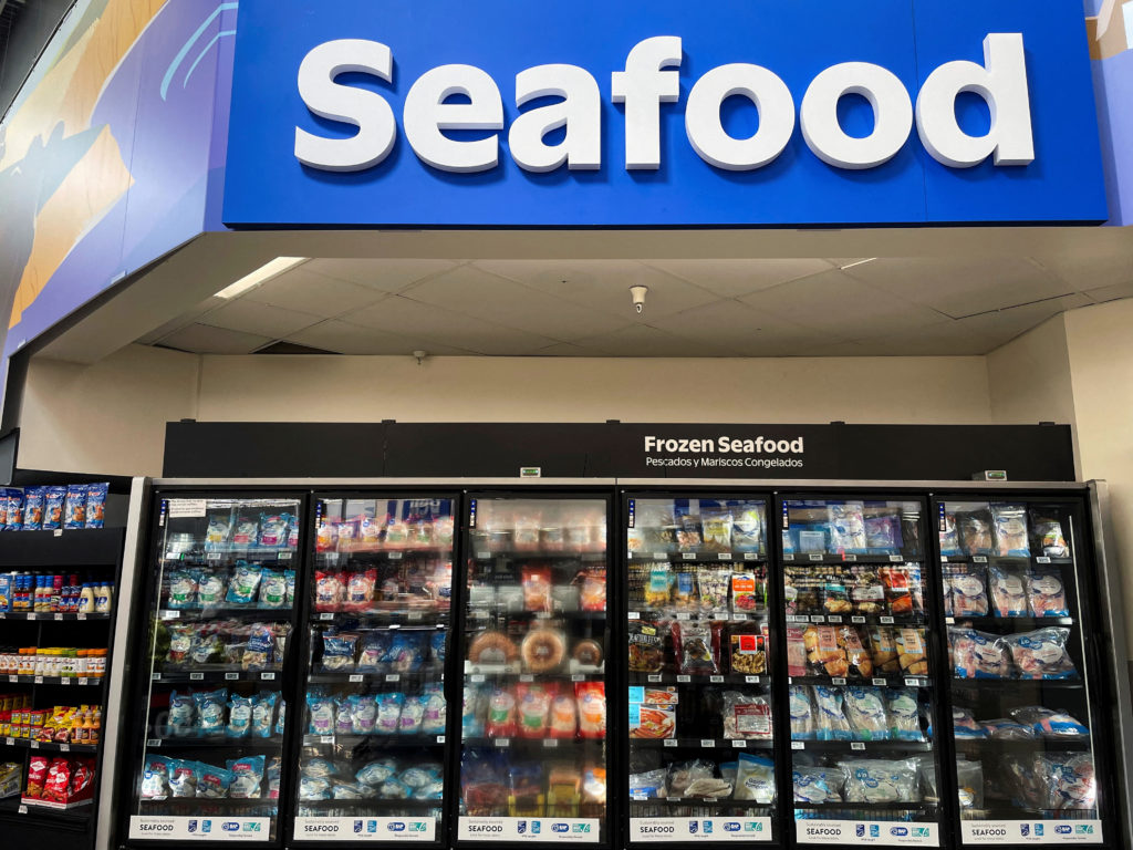 FILE PHOTO: Coolers stocked with chilled and frozen products are displayed at the seafood section in Walmart Supercenter i...