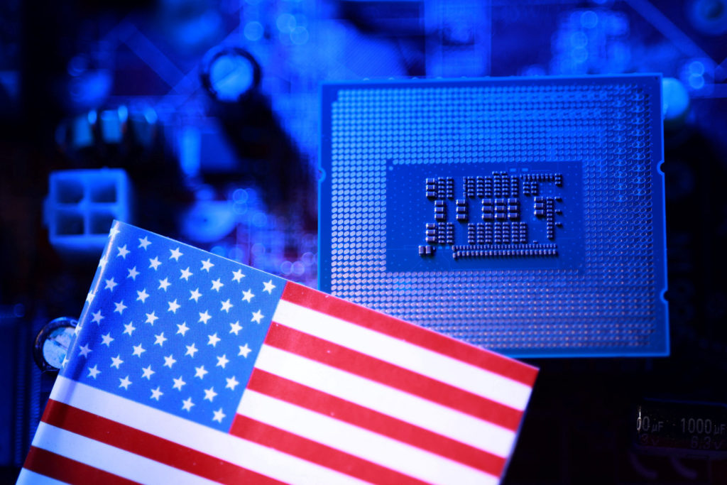 Illustration shows Intel processor and U.S. flag