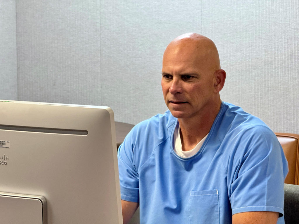Lyle Menendez attends his Board of Parole hearing online from the Richard J. Donovan Correctional Facility in San Diego