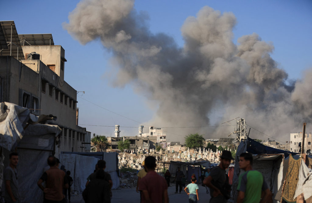 Smoke rises following an explosion during an Israeli operation, in Gaza City