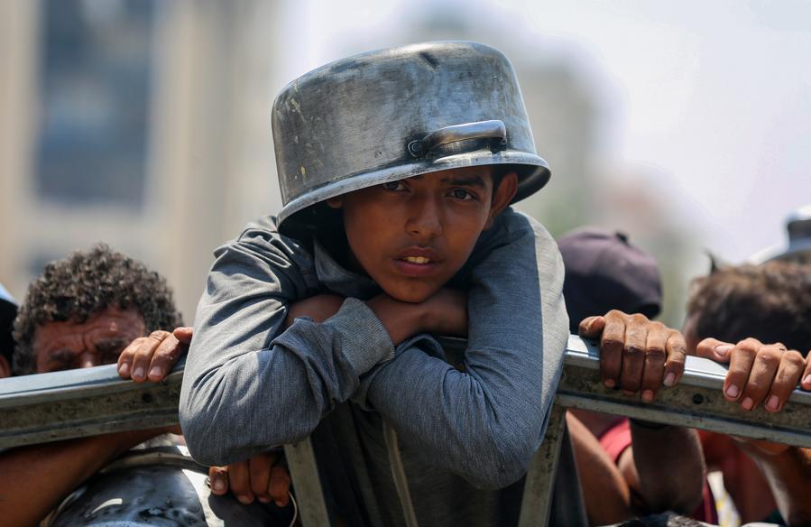 Waiting for food at Gaza's aid distribution sites-Xinhua